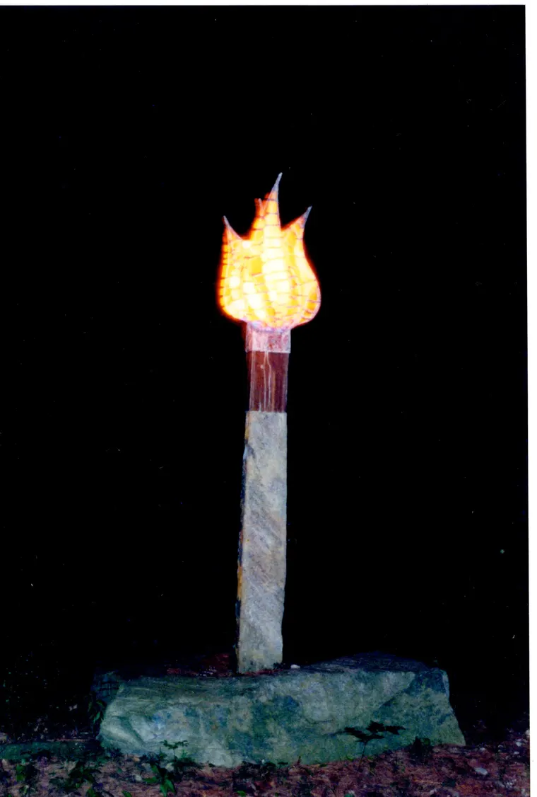 Tulip Torch, then photo