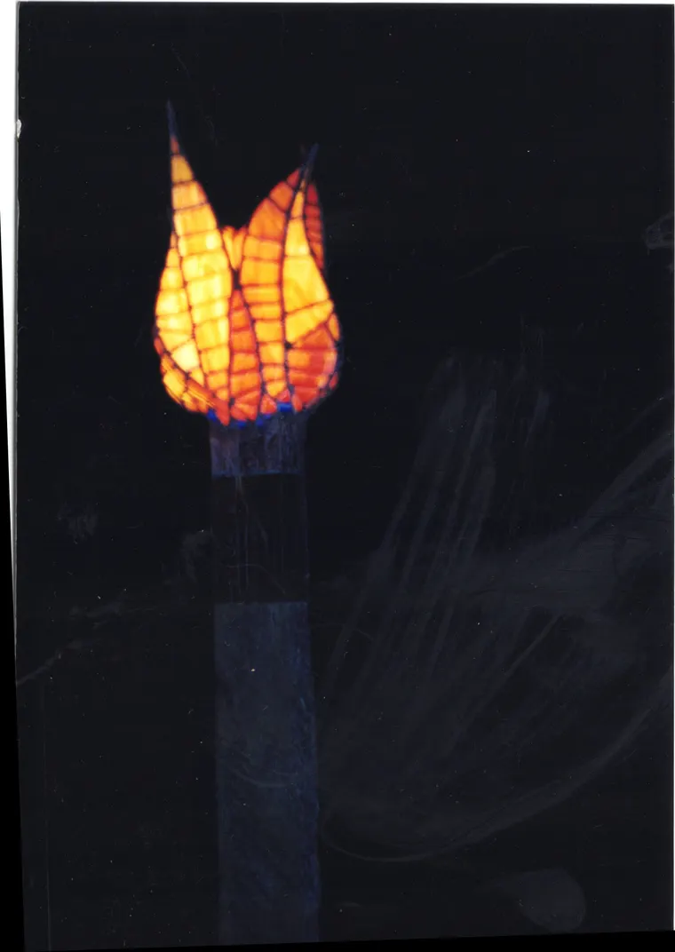 Tulip Torch, then photo